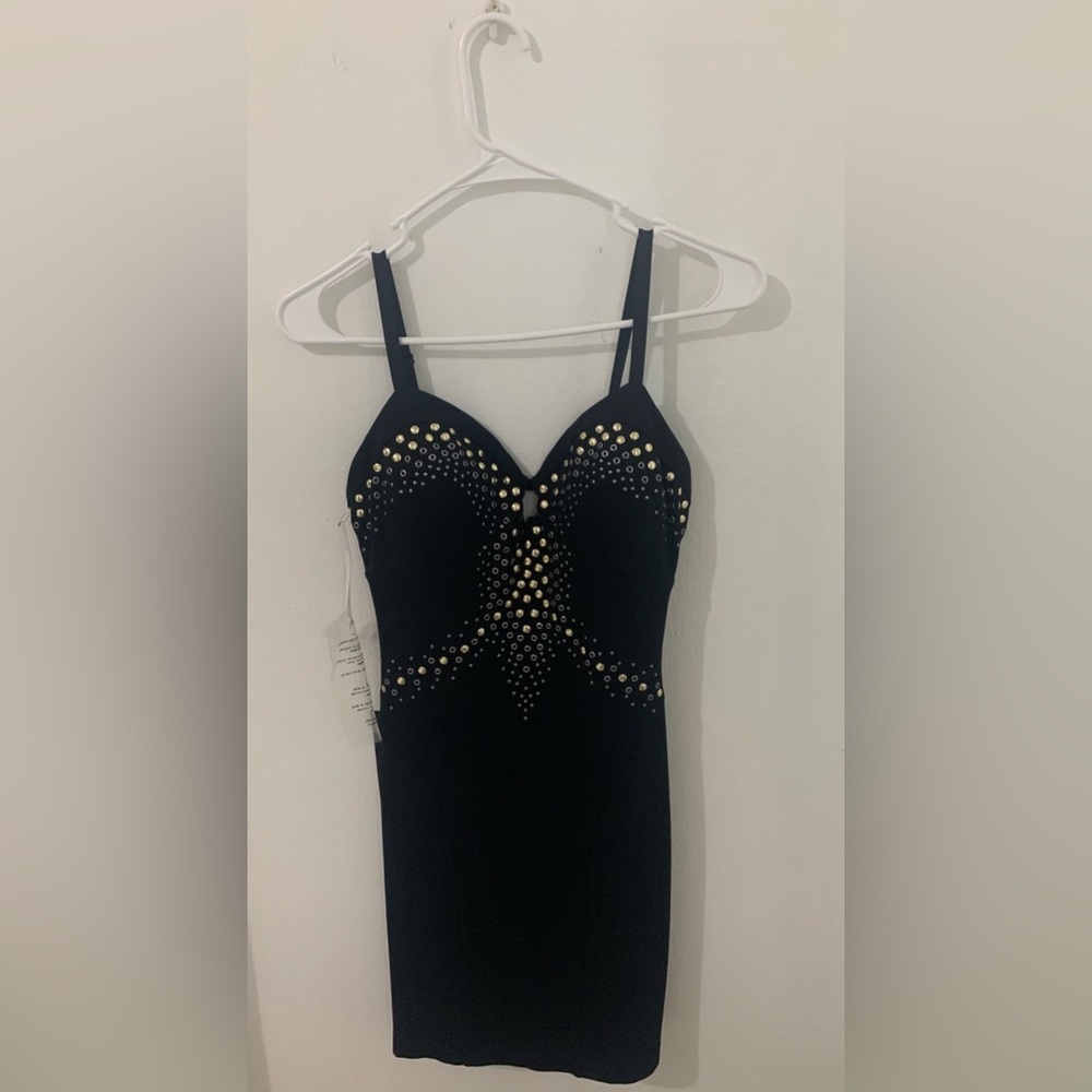 BEBE Grommet cut out dress - NEW with Tags- black